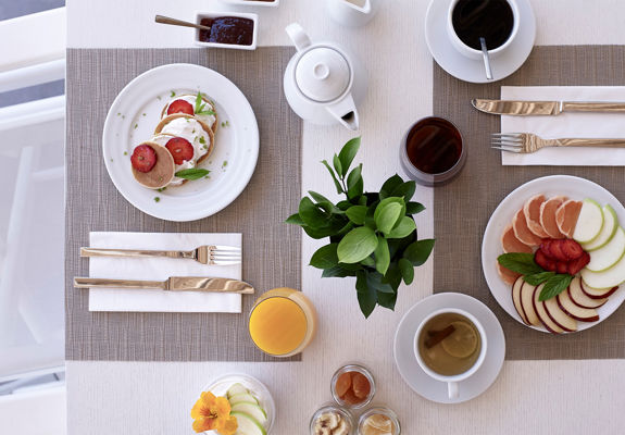 Knossos Beach Yefsis Restaurant table for two with breakfast