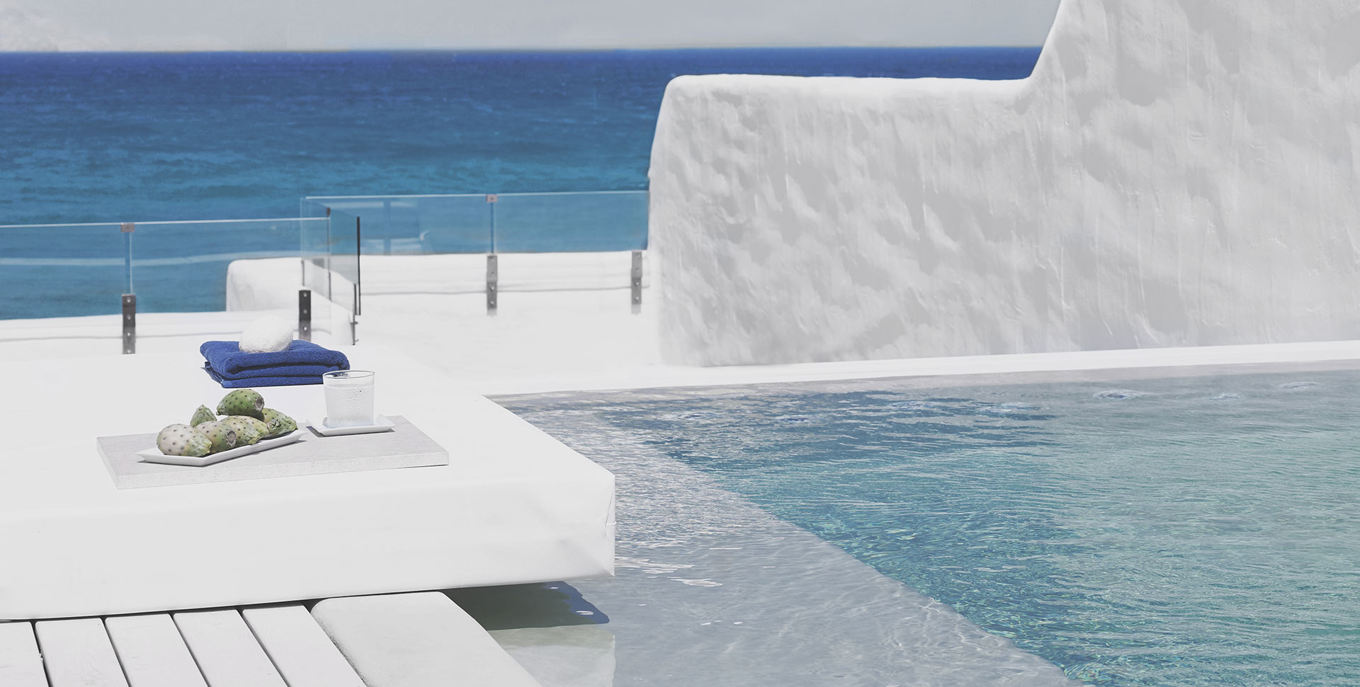 Knossos Beach pool view with the sea in the background