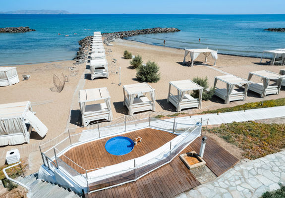 Knossos Beach Dog Pool area with a dog in it and view of the beach