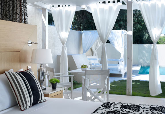 Knossos Beach Two Bedroom Spa Suite Sea View Private Pool double bed and terrace view