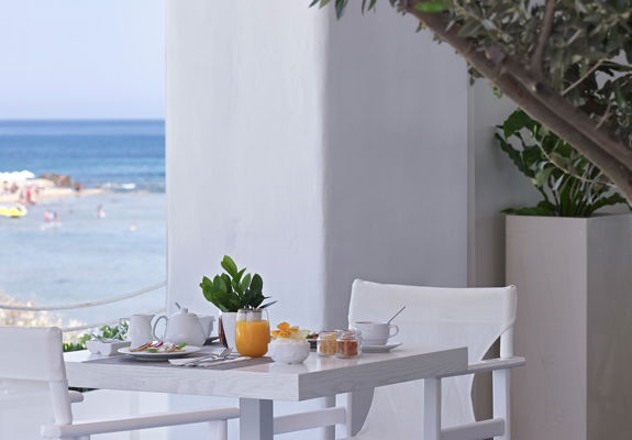 Knossos Beach Yefsis Restaurant breakfast table for two