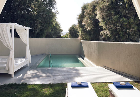 Knossos Beach Two Bedroom Spa Suite Sea View Private Pool terrace with pool, sunbeds and a gazebo