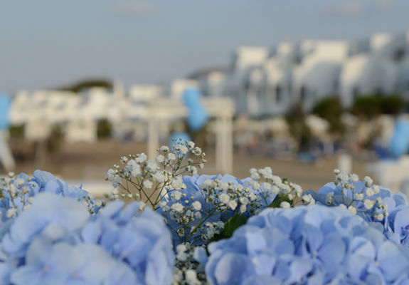 Knossos Beach Wedding decorations with the hotel blurred in the background